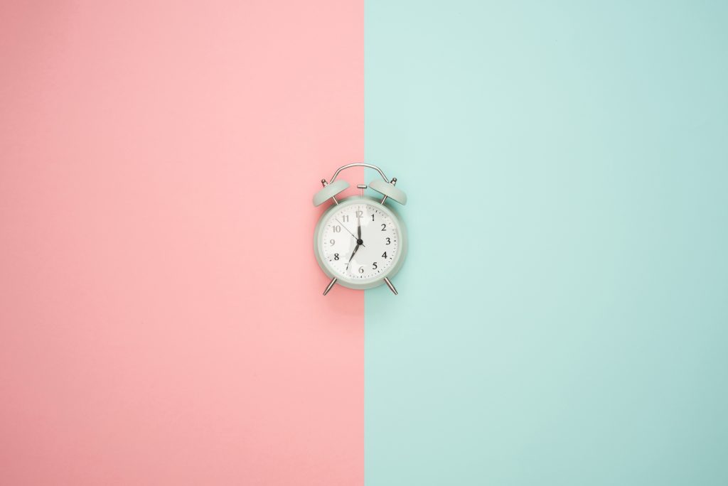 Culture of busyness, picture of a clock to reinforce the text which suggests setting a timer to increase efficiency with tasks.